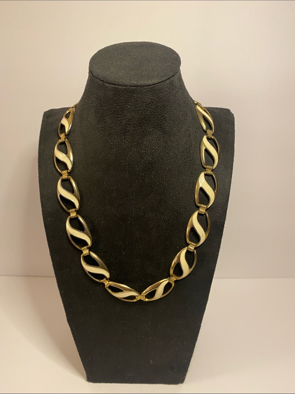 Gold and white necklace